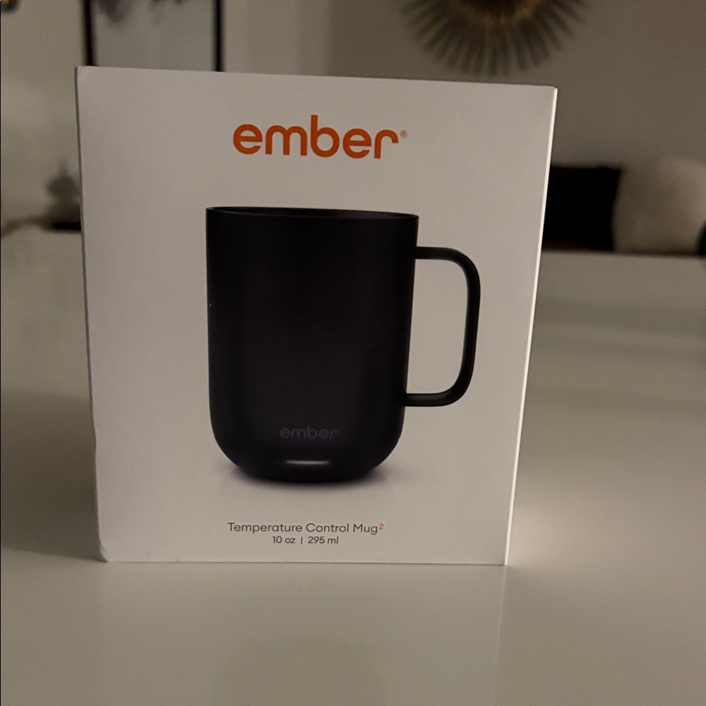 Ember Black Temperature Control Mug² - branded with Comcast Business on it